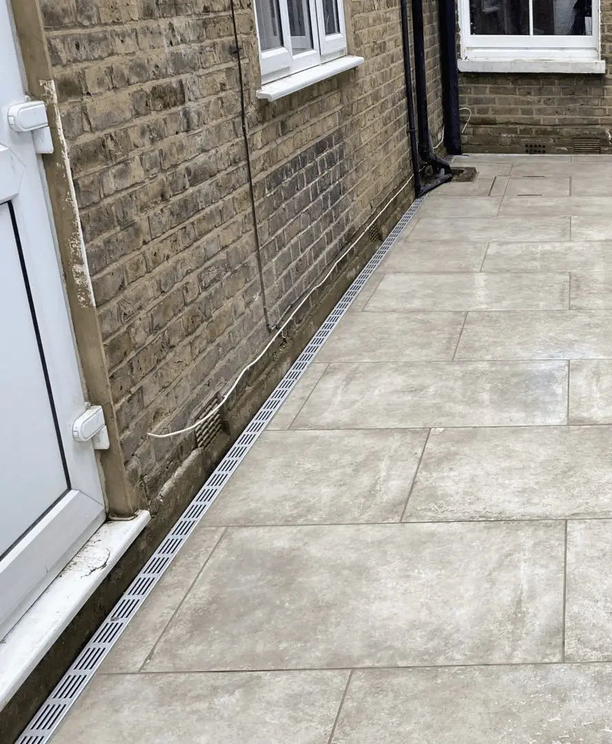 Courtyard patio- threshold linear drain channel