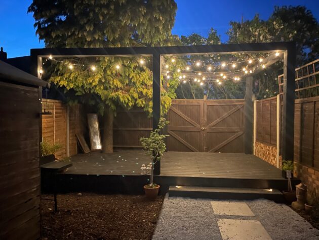 Pergola lit up at night