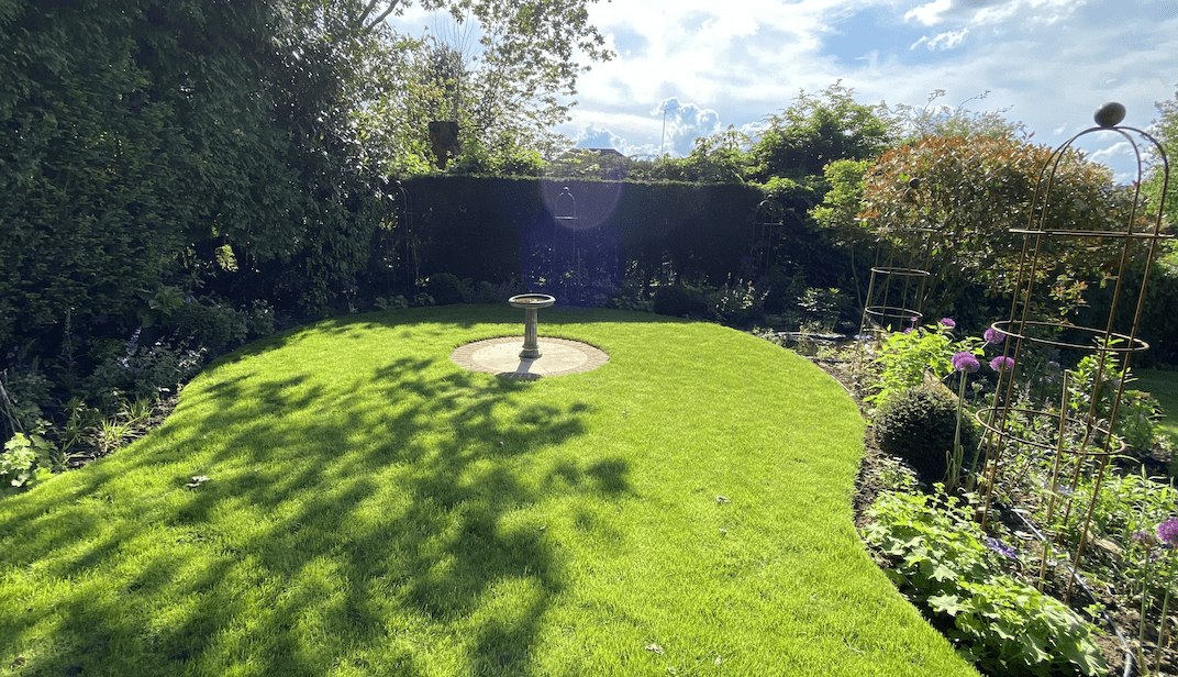 Circular lawn with central feature
