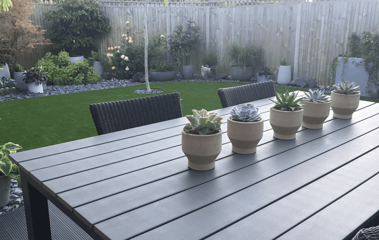 Black decking and artificial grass